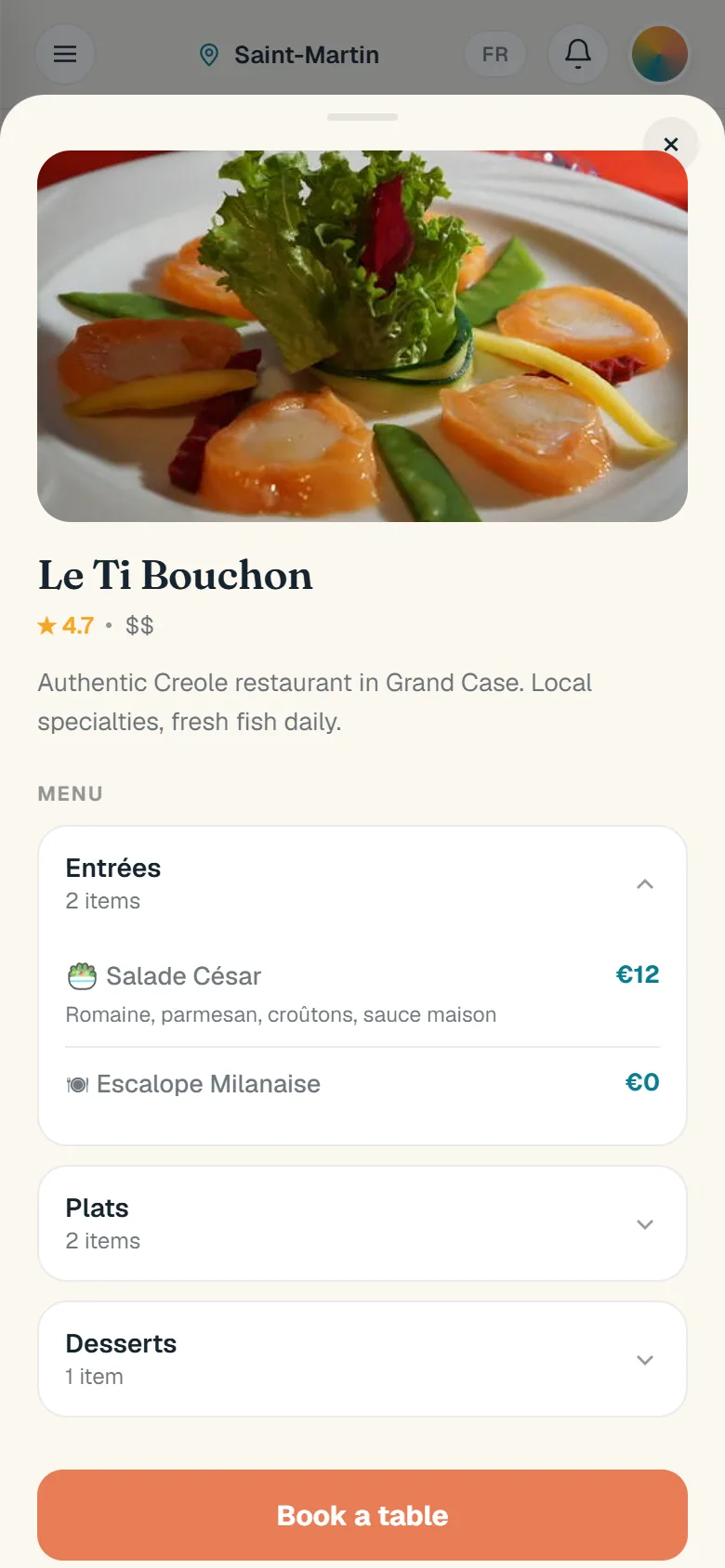A Creole restaurant opened: its description, its menu by section and a Book a table button.